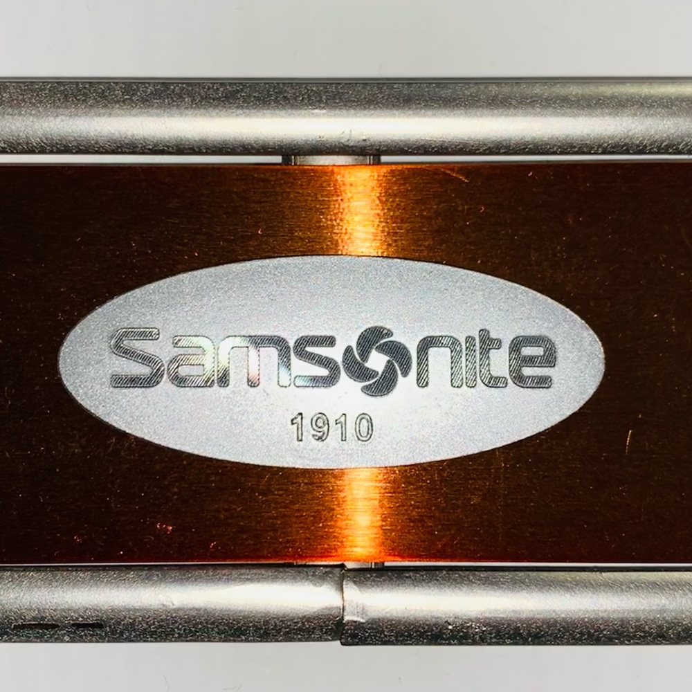 Samsonite Satin Nickel 8-Hook Door Hanger w. Copper Colored Panel & Brand Plate